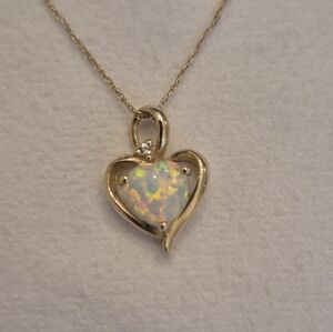 Beautiful Opal and diamond necklace in 10k solid gold